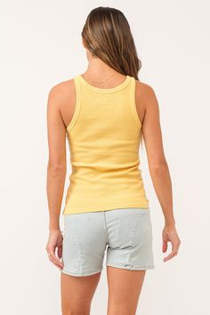 Racer back tank, crew neck finished sleeveless with ribbed neck & armhole band. Solid color knit fitted. The perfect match, the always comfortable and lavish, forever indulged.Body length from HPS: 23", Sleeve length: N/A, Bust: 29" (Size Small) 96% COTTON 4% SPANDEX Machine wash cold, Tumble dry low Imported Spring Everyday Racerback Tops, Basic Crew Neck Tank Top For Spring, Everyday Spring Crew Neck Vest, Cotton Racerback Top, Ribbed Racerback Tank Top For Spring, Sporty Crew Neck Vest For Spring, Spring Sporty Crew Neck Vest, Spring Crew Neck Tank Top For Everyday, Crew Neck Tank Top For Everyday Spring Wear