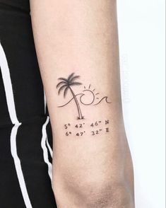 a small palm tree tattoo on the right arm and shoulder, with coordinatess for measurements