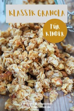 a close up of granola on a wooden table