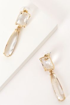 It's so clear to see why the Lulus Clearly Glamorous Gold and Clear Drop Earrings are our new go-to for dressing up our party outfits! These clear resin earrings have a faceted crystal-like design that create a dazzling drop silhouette. Post backs. Earing measure 2" LongMan Made Materials. Imported. Lulus | Clearly Glamorous Gold and Clear Drop Earrings. Clear Dangle Jewelry For Party, Clear Crystal Earrings For Party, Party Crystal Clear Earrings, Party Clear Crystal Earrings For Pierced Ears, Party Crystal Earrings For Pierced Ears, Chic Clear Earrings For Party, Clear Resin, Faceted Crystal, Party Outfit