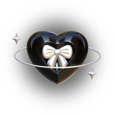 a heart shaped object with a bow on it's side and stars around it