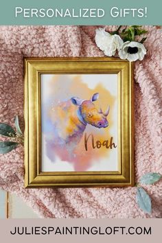 a framed painting with the words personalized gifts on it and an image of a rhino