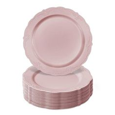 pink plates stacked on top of each other