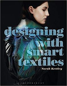 a book cover with an image of a woman's back and the words designing with smart textiles