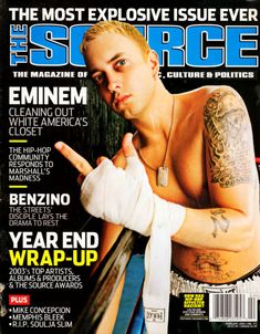 a man with tattoos on the cover of a magazine