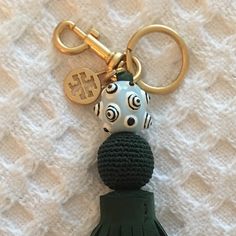 Gorgeous Tory Burch Keychain. Forest Green Sundae Tassel With Knitted Bead Then A Porcelain Blue Dotted Bead On Top. Gold Hardware With Key Ring, Hook And Tb Logo. Never Been Used (Just Changed My Mind After Tossing The Tags). Just Trying To (Almost) Make Back What I Paid = Price Firm Key Holder Wallet, Tory Burch Kira Chevron, Marc Jacobs Wallet, Pearl Logo, Ring Hook, Kira Chevron, Tory Burch Kira, Tory Burch Robinson, Porcelain Blue