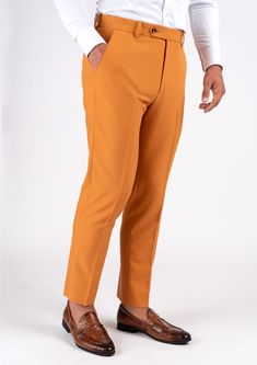 With a mustard-hue and stretch cotton fabric, you'll feel comfortable and stylish all day long in this unique custom made pants. Stand out and enjoy the compliments! Fitted Orange Straight Pants, Stretch Orange Pants For Workwear, Orange Stretch Pants For Workwear, Fitted Orange Ankle-length Pants, Fitted Mustard Bottoms For Workwear, Mustard Fitted Bottoms For Workwear, Tailored Brown Cotton Pants, Fitted Orange Cotton Pants, Yellow Cotton Pants For Fall