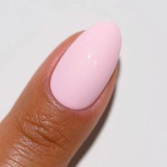 A bubbly pastel pink creme. The duo includes: 1 Soak-Off Gel Size: 0.5 fl oz 1 Nail Lacquer Size: 0.5 fl oz Color Accuracy: The duo comes with 1 lacquer and 1 gel in matching colors. We do not guarantee matching exact colors due to differences in formulation, ingredients, and batch. Benefits: Lasts up to 21 days LED and UV cured Made in USA Wide range of colors Fused with vitamins that make nails stronger, healthier and stunning for weeks HOW TO: Gel Polish Application - Prep your nails - Remove old nail polish and oil. Push back cuticles gently using a cuticle pusher. Apply 1st thin layer of base coat and cure under a lamp for 30-45 seconds Apply a thin layer of the DND Gel Polish. Cure under UV/LED lamp for 30-60 seconds. Repeat 2-3 coats if needed. Apply a top coat and cure under UV/LED Pale Pink Almond Nails, Nails Stronger, Dnd Gel Nail Polish, Dnd Nail Polish, Make Nails, Acrylic Nails Almond Shape, Pastel Pink Nails, Gel Polish Nail Designs, Bright Pink Nails