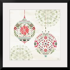 two christmas ornaments hanging from the ceiling in front of a wall with snowflakes on it