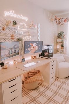 a white desk topped with two computer monitors