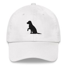 "Black labrador retriever hat | black lab hat Dad hats aren't just for dads. This one's got a low profile with an adjustable strap and curved visor. * 100% chino cotton twill * Green Camo color is 35% chino cotton twill, 65% polyester * Unstructured, 6-panel, low-profile * 6 embroidered eyelets * 3 ⅛\" (7.6 cm) crown * Adjustable strap with antique buckle * Blank product sourced from Vietnam or Bangladesh This product is made especially for you as soon as you place an order, which is why it takes us a bit longer to deliver it to you. Making products on demand instead of in bulk helps reduce overproduction, so thank you for making thoughtful purchasing decisions! 🛍️Return Policy At Just Simply Dad Designs, we are committed to providing you with high-quality, custom-made products that are c Black Lab Hat, Black Hunting Cap, Outdoor Military Dad Hat, Labrador Mama Shirt, Black Labrador Retriever, Mom Hats, Black Lab, Camo Colors, Black Labrador