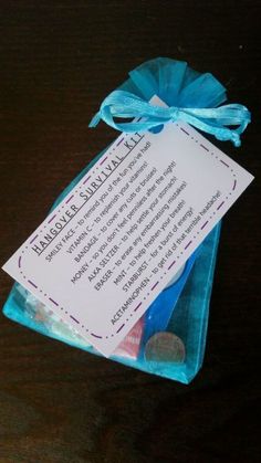 a blue bag with a note attached to it