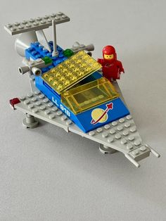 there is a small toy boat made out of legos