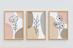 three framed art pieces with flowers on them