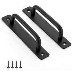 two black door handles with screws on white background