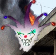 an image of a scary clown face on the side of a building