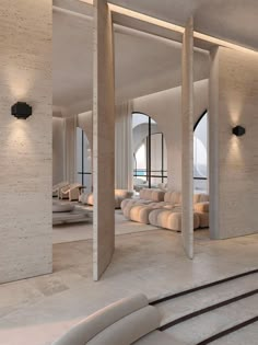 the interior of a modern hotel with white walls