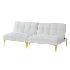 a white couch sitting on top of a wooden frame