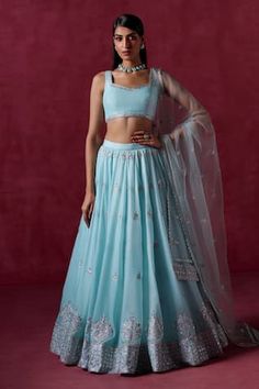 Sky blue attached cancan lehenga featuring zari, sequin embroidery in floral pattern. Paired with a padded, embroidered hem blouse and a lace detailed dupatta. - Aza Fashions Lehenga Models, Light Blue Lehenga, Crepe Lehenga, Sky Blue Lehenga, Lehenga Blue, Pastel Lehenga, Dupatta Embroidery, Engagement Lehenga, Kurta Lehenga