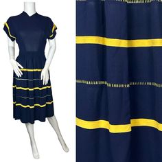 A rather fab 1940s dress in classic navy rayon with a striking yellow stripe and bands of yellow ladder stitch.  The cap sleeves have little vents at the shoulders and yellow bows.  There is a side metal zipper and another at the back of the neck.  There are belt loops but no belt.  Great condition with minor signs of age appropriate wear but no issues to note.  24 inch waist, comfortably stretched to 25 32 inch waist with vertical  darts from the waist  so up to 34 15.5 inches shoulder to centr 24 Inch Waist, Ladder Stitch, 1940s Dresses, Yellow Colour, Antique Clothing, Modern Outfits, Yellow Stripes, Colour Block, Day Dress