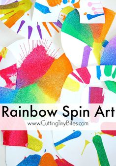 rainbow spin art project for kids to make with paper plates and glue on the surface