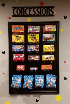 a display case with candy bars on it