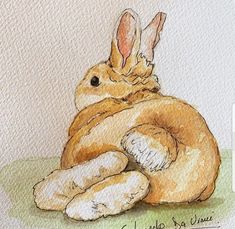 a watercolor painting of a brown bunny sitting on the ground with its eyes closed