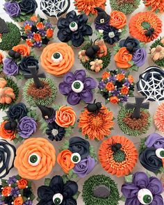 halloween cupcakes decorated with fake flowers and eyes