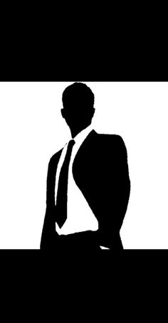 a black and white silhouette of a man in a suit sitting at a desk with his hands on his hips