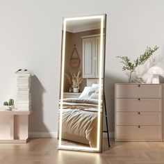 a bedroom scene with focus on the bed and an illuminated mirror in the foreground