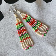 These teardrop beaded earrings are made with stainless steel findings, and three hanging loop strands of Japanese Miyuki and/or Czech beads. Most earrings I make in this style have a pattern in groups of fours or sevens. Four being for the four directions, and seven being for the seven clans of my tribe.  Colors used in this design: cream, red, pink, green, and lime. From top of hook to bottom bead is approximately 3.5" long.  Hooks are stainless steel and come with clear backings.  Nickel free product. Made in a pet free, smoke free, and peanut free home. 100% Native American made with love. My earrings are made for all wearers. ♡ Steampunk Crafts, Four Directions, Beads Pictures, Earrings Diy, Free Product, Peanut Free, Teardrop Beads