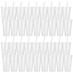 a bunch of cups with straws in them on a white background, all lined up and ready to be eaten