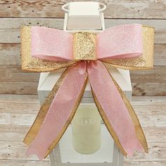 *This is a handmade bow made with wired glittered gold ribbon and pink ribbon. *This listing is for the BOW ONLY. Lantern and candle are not included. Display lantern is approximately 14 inches tall for size reference.* *This bow would be a great addition to a wreath, garland, swag, lantern, basket, gift wrapping or pary decor. *Bow measures approximately 8 inches wide and 12 inches from top to bottom. Basket Gift Wrapping, Bow Party, Gold Wreath, Bridal Shower Decor, Bow Christmas, Christmas Bow, Decorations Wedding, Glitter Bow, Wreath Bow