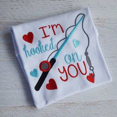 i'm hooked up on you embroidered t - shirt with fishing hook and hearts