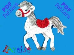 a crocheted white horse with a red heart on it's chest and tail