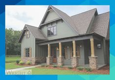 a large gray house with stone pillars and windows