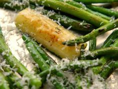 asparagus with parmesan cheese on top