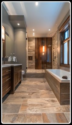 a large bathroom with stone flooring and wood accents, including a bathtub in the center