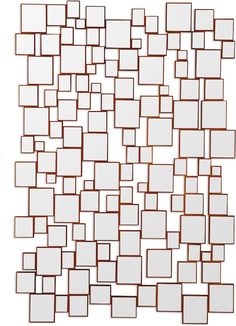 a white and brown wall with squares on it's sides, all arranged in the same square pattern