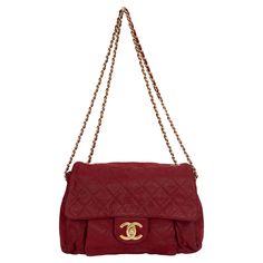 The Chanel Iridescent Calfskin Quilt Flap Bag features a shimmery calfskin quilted leather in red, a gold chain link intertwined leather shoulder strap and a CC turn lock. One interior pocket. Shoulder drop 9.5"/18". Collection 17. Comes with hologram and original dust cover. Chanel 19 Red Bag, Red Bag, Red A, Quilted Leather, Dust Cover, Flap Bag, Fashion Handbags, Red Gold, Chain Link