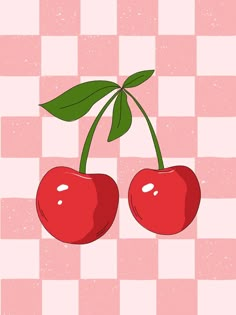 two cherries on a pink and white checkered background