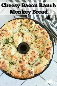 cheesy bacon ranch monkey bread in a cast iron skillet on a table