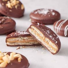 chocolate covered cookies with nuts on the side