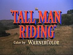 the title for tall man riding is shown in red, blue and black letters on a field