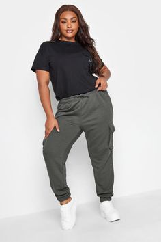 Shop YOURS Curve Grey Cargo Joggers at Yours Clothing. Discover women’s plus size clothing in sizes 10-36 with fast delivery. Plus Size Joggers, Elegant Wedding Guest Dress, Curve Fashion, Plus Swimwear, Next Fashion, Cargo Joggers, Stylish Plus, Leg Design, Shoes With Jeans