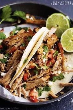 shredded pork tacos with cilantro and lime