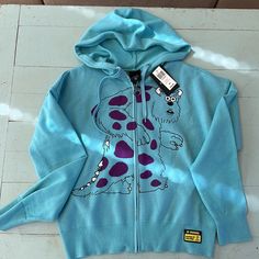 This Is The Cutest Sweater For Any Monsters Inc Fan! Brand New With Tags Attached, Size Woman’s Medium And Has A Full Zipper In The Front And Has A Hood. Sweater With Hood, Disney Sweaters, Monsters Inc, Zip Up Sweater, Cute Sweaters, Blue Purple, Pixar, The Cutest, Sweaters & Cardigans