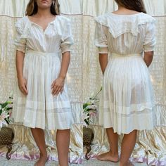 "stunning, voluminous edwardian cotton voile lawn dress with inset lace panels. puff sleeves, the sweetest sailor collar, and a full, tiered skirt. era: 1910s size: best fits small. model is 5'4\" 34/27/38 measurements: 12\" shoulder to shoulder 38\" bust 27.5\" waist free hips 37\" shoulder to hem fabric content: cotton condition: very good - a light stain at back skirt and a few small pinholes." Cottagecore Victorian Dress For Daywear, Vintage White Victorian Day Dress With Ruffles, Vintage White Victorian Dress With Ruffles For Daywear, Cottagecore Victorian Dress With Ruffles For Daywear, Victorian Style Ruffled Vintage White Dress, Victorian Vintage White Dress With Ruffles, Victorian Vintage White Ruffled Dress, Victorian Summer Dress With Ruffles, Vintage White Dress With Ruffles For Daywear