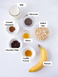 the ingredients for an oatmeal smoothie laid out on a white surface