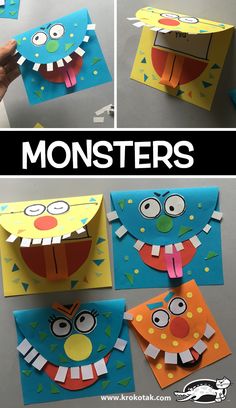 some paper monsters are on display with their mouths open